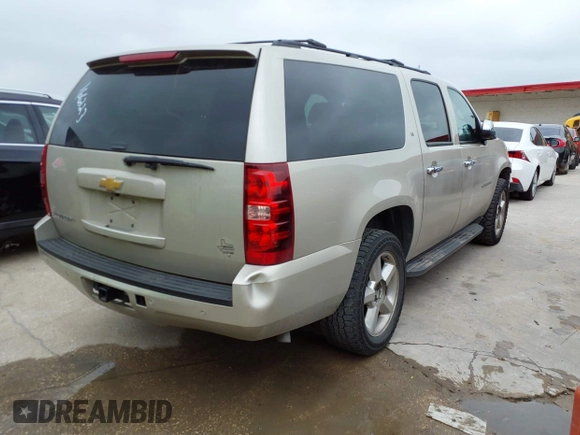 2013 Chevrolet Suburban LT with VIN 1GNSKJE74DR166223, listed as a IAAI auction lot 42172184 with 200,901 mi miles and . Bid and sale history available at DreamBid. Image 4.