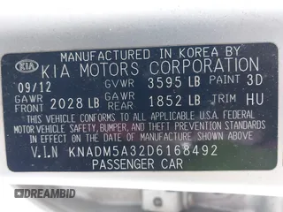 2013 Kia Rio LX with VIN KNADM5A32D6168492, listed as a IAAI auction lot 42144898 with 127,228 mi miles. Bid and sale history available at carsss.com. Image 9.