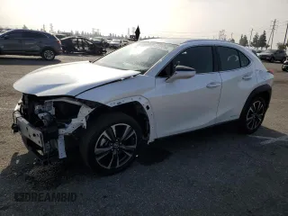 2022 Lexus UX with VIN JTHX9JBH2N2056285, listed as a Copart auction lot 87221214 with 33,377 mi miles and Salvage Title. Bid and sale history available at carsss.com. Image 1.