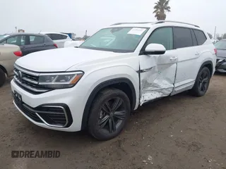 2022 Volkswagen Atlas 3.6L V6 SEL R-Line with VIN 1V2AR2CA5NC548221, listed as a IAAI auction lot 41781601 with 36,922 mi miles. Bid and sale history available at carsss.com. Image 2.