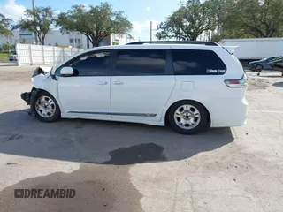 2015 Toyota Sienna SE with VIN 5TDXK3DC4FS678965, listed as a IAAI auction lot 40817635 with 147,027 mi miles. Bid and sale history available at carsss.com. Image 14.