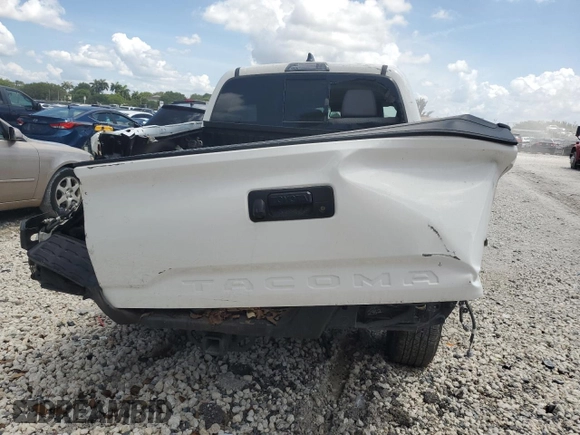 2023 Toyota Tacoma SR5 z VIN 3TYAZ5CN7PT042367, wystawiony jako Copart lot #60100495 z przebiegiem Nie podano mil oraz Nie do naprawy • Non repairable. Historia ofert i sprzedaży dostępna na DreamBid. Obrazek 6.