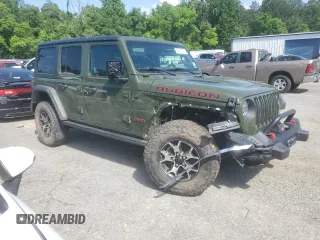 2021 Jeep Wrangler Unlimited Rubicon z VIN 1C4HJXFN8MW547855, wystawiony jako Copart lot #55619075 z przebiegiem 49 762 mil mil oraz Szkoda całkowita • Salvage title. Historia ofert i sprzedaży dostępna na DreamBid. Obrazek 4.