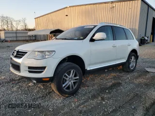 2009 Volkswagen Touareg VR6 z VIN WVGBE77L79D017480, wystawiony jako Copart lot #89344415 z przebiegiem 54 232 mil mil oraz Szkoda całkowita • Salvage title. Historia ofert i sprzedaży dostępna na DreamBid. Obrazek 1.