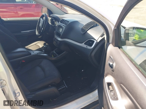 2014 Dodge Journey SE with VIN 3C4PDCAB9ET121415, listed as a IAAI auction lot 42138601 with 157,043 mi miles. Bid and sale history available at carsss.com. Image 5.