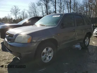 2003 Mazda Tribute LX with VIN 4F2YZ94123KM06595, listed as a Copart auction lot 44111665 with Not Provided miles and Salvage Title. Bid and sale history available at carsss.com. Image 1.