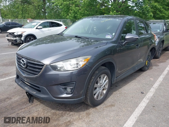 2016 Mazda CX-5 Touring z VIN JM3KE4CY4G0692655, wystawiony jako IAAI lot #42318657 z przebiegiem 212 826 mil mil oraz . Historia ofert i sprzedaży dostępna na DreamBid. Obrazek 17.