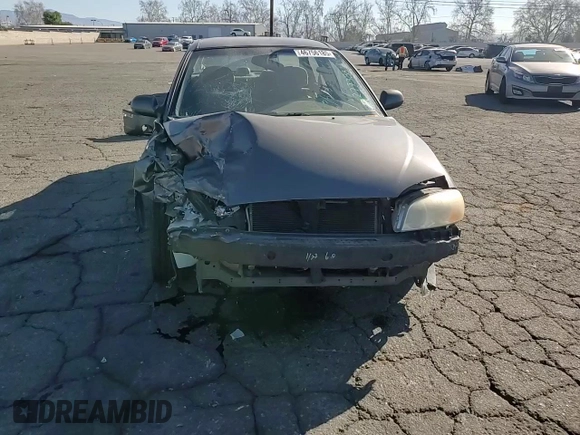 2003 Kia Spectra z VIN KNAFB121335277388, wystawiony jako Copart lot #46756185 z przebiegiem 151 235 mil mil oraz Szkoda całkowita • Salvage title. Historia ofert i sprzedaży dostępna na DreamBid. Obrazek 10.
