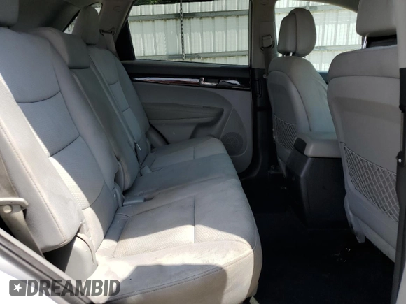 2013 Kia Sorento LX with VIN 5XYKT4A20DG323200, listed as a Copart auction lot 61738005 with 205,312 mi miles and Salvage title. Bid and sale history available at DreamBid. Image 11.