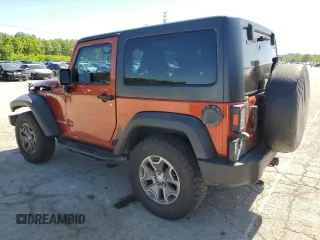 2014 Jeep Wrangler Rubicon with VIN 1C4BJWCG9EL285532, listed as a Copart auction lot 56548325 with 100,032 mi miles and Salvage title. Bid and sale history available at DreamBid. Image 2.