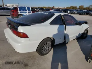 1999 Acura Integra SE with VIN JH4DC4463XS003082, listed as a Copart auction lot 83186044 with 196,255 mi miles and Salvage title. Bid and sale history available at DreamBid. Image 3.