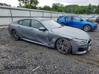 2022 BMW 8 Series 840i with VIN WBAGV4C05NCH54150, listed as a Copart auction lot 62773975 with 26,895 mi miles and Salvage title. Bid and sale history available at DreamBid. Image 4.