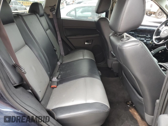 2009 Jeep Grand Cherokee Laredo with VIN 1J8HR48P49C545334, listed as a Copart auction lot 71562344 with 183,976 mi miles and Salvage Title. Bid and sale history available at carsss.com. Image 11.