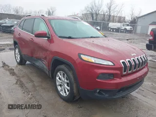 2015 Jeep Cherokee Latitude z VIN 1C4PJMCS1FW649201, wystawiony jako IAAI lot #41976056 z przebiegiem 74 991 mil mil oraz . Historia ofert i sprzedaży dostępna na DreamBid. Obrazek 1.