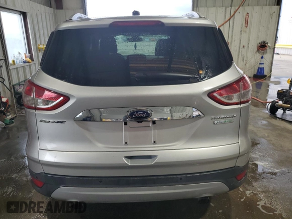 2014 Ford Escape Titanium с VIN 1FMCU0J98EUA35069, выставлен на аукционе Copart как лот 58369635 с пробегом 92 323 миль миль и Списание • Salvage title. История ставок и продаж доступна на DreamBid. Изображение 6.