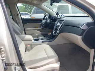 2013 Cadillac SRX Performance Collection with VIN 3GYFNDE34DS634099, listed as a IAAI auction lot 41931125 with 134,318 mi miles and . Bid and sale history available at carsss.com. Image 5.