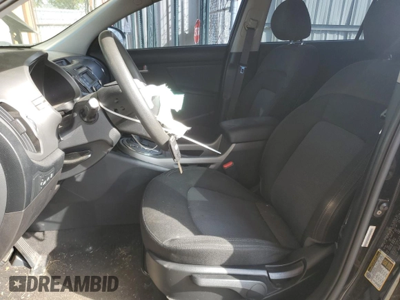 2015 Kia Sportage LX with VIN KNDPB3AC1F7737775, listed as a Copart auction lot 72236174 with 97,311 mi miles and Salvage Title. Bid and sale history available at DreamBid. Image 7.