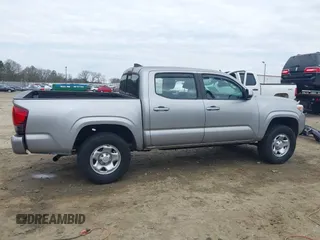 2018 Toyota Tacoma SR with VIN 3TMCZ5AN4JM130307, listed as a IAAI auction lot 41541477 with 74,369 mi miles and . Bid and sale history available at DreamBid. Image 14.