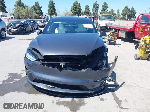 2022 Tesla Model X with VIN 7SAXCAE59NF360301, listed as a IAAI auction lot 41945059 with Not Provided miles and . Bid and sale history available at DreamBid. Image 12.