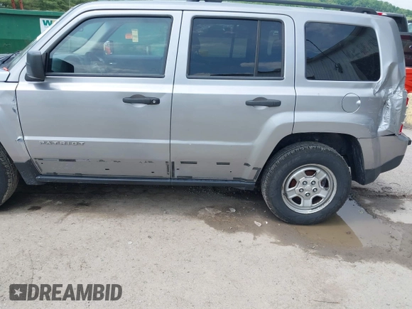 2014 Jeep Patriot Sport with VIN 1C4NJPBB7ED773445, listed as a IAAI auction lot 42205816 with 121,778 mi miles and . Bid and sale history available at DreamBid. Image 6.