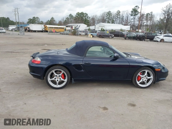 2003 Porsche Boxster S с VIN WP0CB29853U662035, выставлен на аукционе IAAI как лот 41845536 с пробегом 42 026 миль миль и . История ставок и продаж доступна на DreamBid. Изображение 13.
