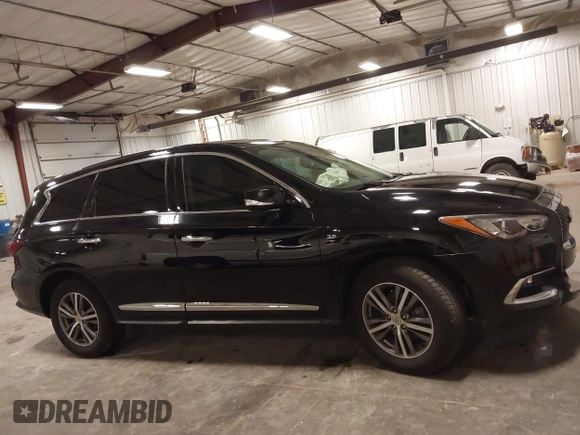2019 Infiniti QX60 Luxe with VIN 5N1DL0MMXKC565309, listed as a IAAI auction lot 42184987 with 129,985 mi miles and . Bid and sale history available at DreamBid. Image 14.