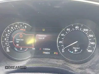2015 Lincoln MKC with VIN 5LMTJ2AH2FUJ12531, listed as a IAAI auction lot 41639903 with 112,835 mi miles. Bid and sale history available at carsss.com. Image 7.