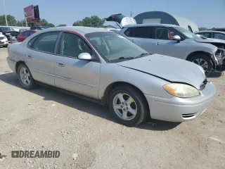 2004 Ford Taurus SE with VIN 1FAFP53U04G133586, listed as a Copart auction lot 59972925 with 228,938 mi miles and Salvage title. Bid and sale history available at DreamBid. Image 4.