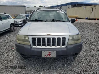 2004 Jeep Grand Cherokee Laredo z VIN 1J4GX48N94C386031, wystawiony jako Copart lot #55804755 z przebiegiem 160 103 mil mil oraz Szkoda całkowita • Salvage title. Historia ofert i sprzedaży dostępna na DreamBid. Obrazek 5.