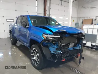 2023 Chevrolet Colorado 4WD Z71 with VIN 1GCPTDEK3P1144315, listed as a IAAI auction lot 41306558 with 14,592 mi miles and . Bid and sale history available at DreamBid. Image 1.