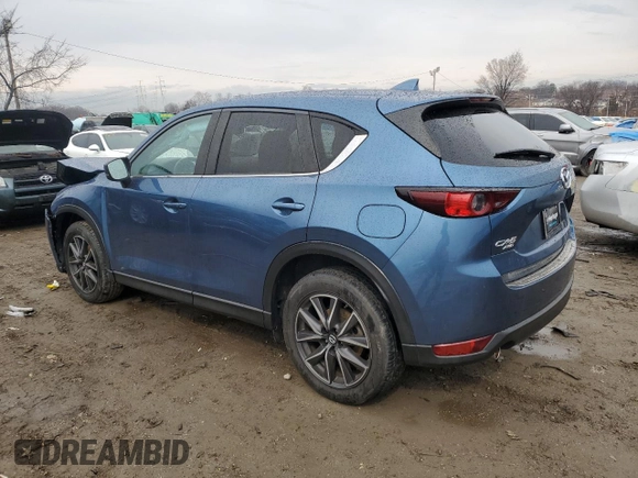 2018 Mazda CX-5 Touring with VIN JM3KFBCM0J0363036, listed as a Copart auction lot 47085755 with 61,928 mi miles and Salvage Title. Bid and sale history available at DreamBid. Image 2.