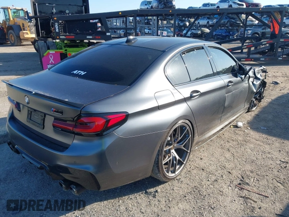 2019 BMW M5 Competition z VIN WBSJF0C59KB447419, wystawiony jako IAAI lot #41997505 z przebiegiem 74 990 mil mil oraz . Historia ofert i sprzedaży dostępna na DreamBid. Obrazek 4.