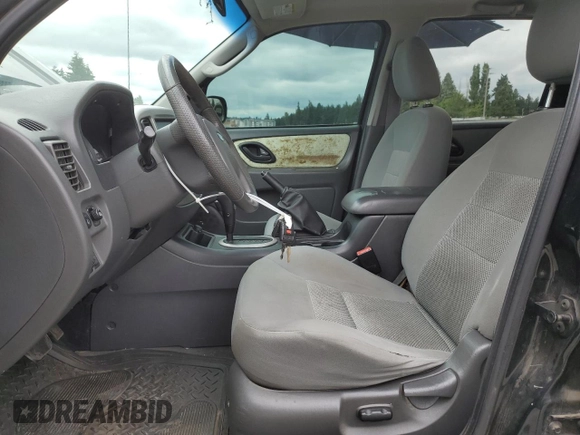 2005 Ford Escape XLT with VIN 1FMYU03165KB36801, listed as a Copart auction lot 61978705 with 217,658 mi miles and Salvage title. Bid and sale history available at DreamBid. Image 7.