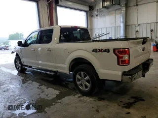 2019 Ford F-150 XL with VIN 1FTFW1E4XKFA16846, listed as a Copart auction lot 61345795 with 128,587 mi miles and Salvage title. Bid and sale history available at DreamBid. Image 2.