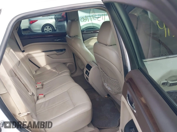 2015 Cadillac SRX Luxury Collection with VIN 3GYFNBE34FS586823, listed as a IAAI auction lot 41554760 with 176,425 mi miles and . Bid and sale history available at carsss.com. Image 8.