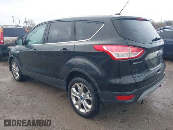 2013 Ford Escape SEL with VIN 1FMCU9H93DUC79592, listed as a IAAI auction lot 42039037 with 63,020 mi miles and . Bid and sale history available at DreamBid. Image 3.