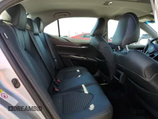 2018 Toyota Camry LE z VIN 4T1B11HK4JU053856, wystawiony jako Copart lot #61017095 z przebiegiem 134 977 mil mil oraz Szkoda całkowita • Salvage title. Historia ofert i sprzedaży dostępna na DreamBid. Obrazek 10.