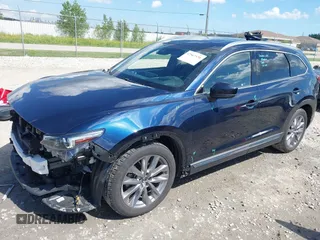 2021 Mazda CX-9 Grand Touring with VIN JM3TCBDY4M0513099, listed as a IAAI auction lot 42563530 with 76,006 mi miles and . Bid and sale history available at DreamBid. Image 18.