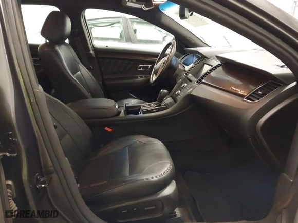 2015 Ford Taurus Limited with VIN 1FAHP2F87FG136199, listed as a IAAI auction lot 41920715 with 173,445 mi miles. Bid and sale history available at carsss.com. Image 5.