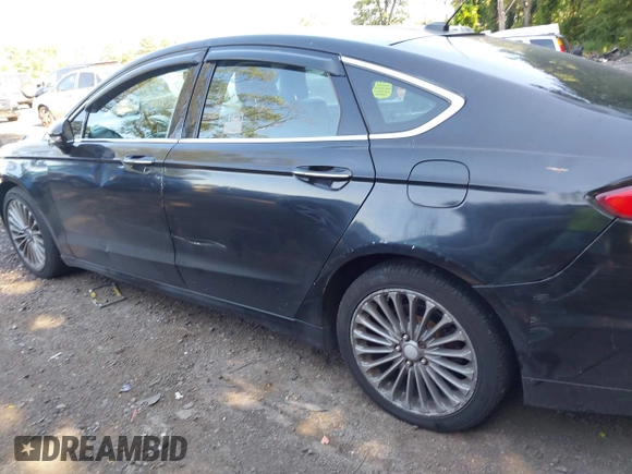 2013 Ford Fusion Titanium with VIN 3FA6P0K91DR115901, listed as a IAAI auction lot 42779096 with 191,451 mi miles and . Bid and sale history available at DreamBid. Image 15.