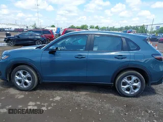 2023 Honda HR-V LX with VIN 3CZRZ2H31PM726863, listed as a IAAI auction lot 42551517 with 28,077 mi miles and . Bid and sale history available at DreamBid. Image 14.
