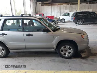 2007 Subaru Forester X z VIN JF1SG63657H732102, wystawiony jako IAAI lot #42141332 z przebiegiem 202 943 mil mil oraz . Historia ofert i sprzedaży dostępna na DreamBid. Obrazek 13.