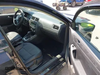 2012 Volkswagen Jetta Sedan SE w/Convenience & Sunroof with VIN 3VWDX7AJ4CM107290, listed as a IAAI auction lot 42142201 with 132,122 mi miles. Bid and sale history available at carsss.com. Image 5.