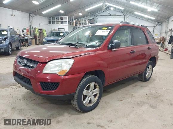 2009 Kia Sportage LX with VIN KNDJE723497555026, listed as a IAAI auction lot 42102679 with 136,398 mi miles. Bid and sale history available at carsss.com. Image 2.