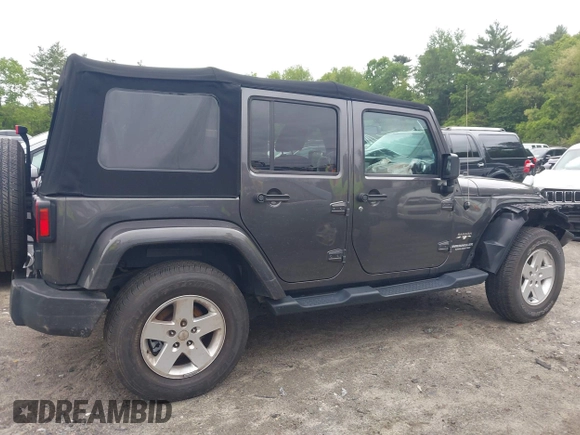2016 Jeep Wrangler Unlimited Sahara z VIN 1C4HJWEG1GL252860, wystawiony jako IAAI lot #42215620 z przebiegiem 85 267 mil mil oraz . Historia ofert i sprzedaży dostępna na DreamBid. Obrazek 13.
