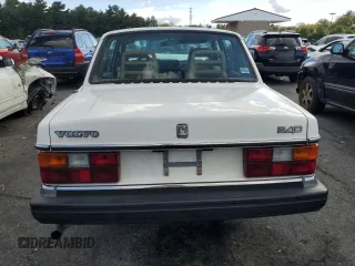1993 Volvo 240 z VIN YV1AS8805P1479399, wystawiony jako Copart lot #72442804 z przebiegiem 163 003 mil mil oraz Szkody całkowita. Historia ofert i sprzedaży dostępna na DreamBid. Obrazek 6.