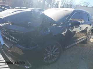 2020 Mazda CX-9 Grand Touring with VIN JM3TCADY8L0405173, listed as a IAAI auction lot 41701533 with 58,119 mi miles and . Bid and sale history available at DreamBid. Image 2.