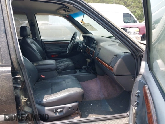 1996 Jeep Grand Cherokee Limited with VIN 1J4GZ78Y9TC351364, listed as a IAAI auction lot 42368001 with 254,634 mi miles and . Bid and sale history available at DreamBid. Image 5.