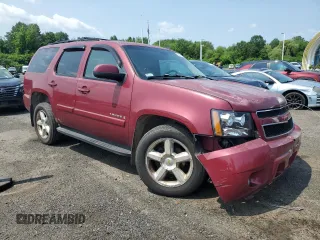 2007 Chevrolet Tahoe LTZ with VIN 1GNFK13007J153690, listed as a Copart auction lot 60614905 with 221,910 mi miles and Salvage title. Bid and sale history available at DreamBid. Image 4.