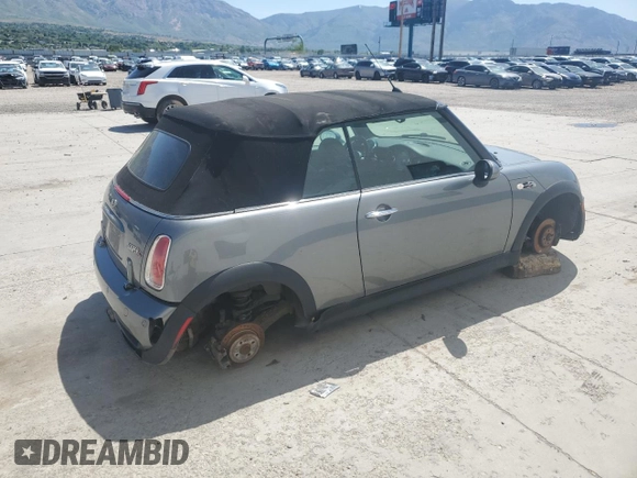 2006 MINI Convertible S with VIN WMWRH33526TL93755, listed as a Copart auction lot 57830835 with Not provided miles and Clean title. Bid and sale history available at DreamBid. Image 3.